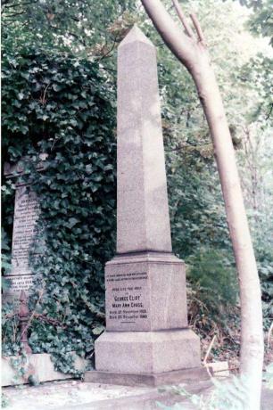 Kamenný obelisk v zahradě s nápisem připomínajícím Eliota